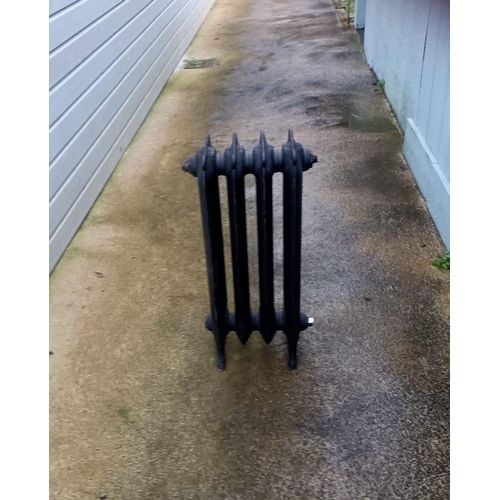 340 - A PAIR OF CAST IRON RADIATORS, dimensions: 1.4ft wide x 2.6ft high approx.