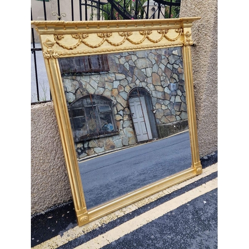 342 - A LARGE DECORATIVE GILT OVERMANTLE MIRROR, square bevelled mirror within decorative frame, with corn... 