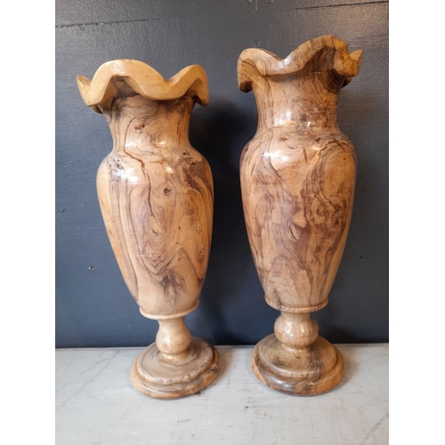 352 - A PAIR OF VERY NICELY TURNED OLIVE WOOD VASES, inscribed to both with Arabic inscription. Dimensions... 