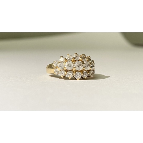 374 - A STUNNING 14CT YELLOW GOLD TRIPLE ROW CLUSTER RING, with five graduated clear gemstones to centre, ... 