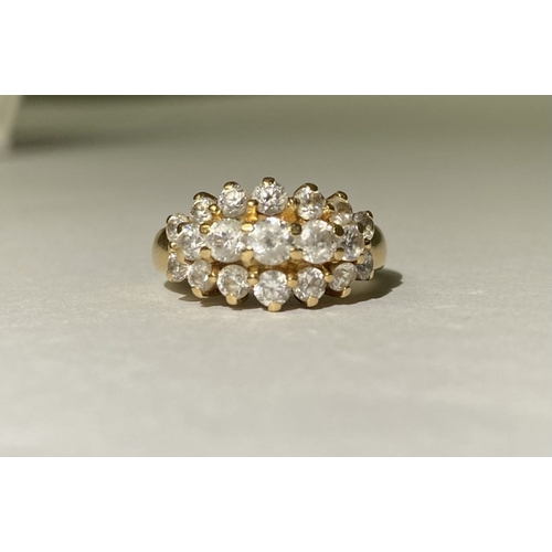 374 - A STUNNING 14CT YELLOW GOLD TRIPLE ROW CLUSTER RING, with five graduated clear gemstones to centre, ... 