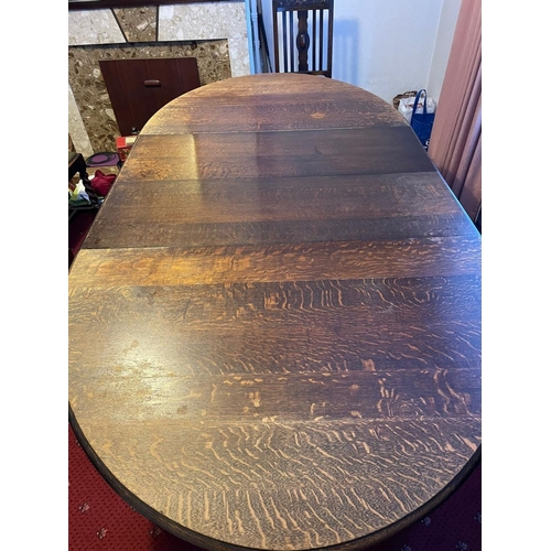 376 - A GOOD OVAL MAHOGANY EXTENDING DINING TABLE, on barley twist leg and bun feet. Dimensions: 150cm dee... 