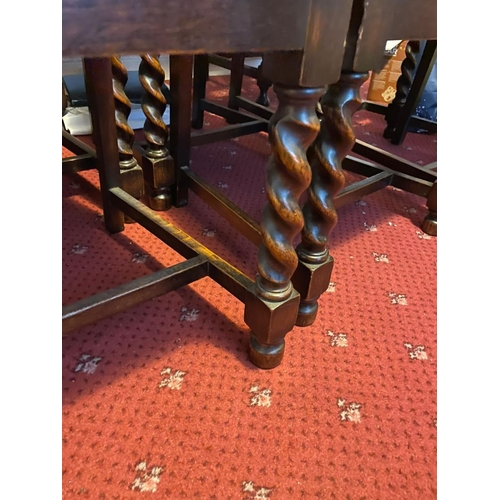 377 - A SET OF SIX BARLEY TWIST DINING CHAIRS, with carving to top rail and shaped splat to back, above le... 