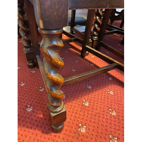 377 - A SET OF SIX BARLEY TWIST DINING CHAIRS, with carving to top rail and shaped splat to back, above le... 