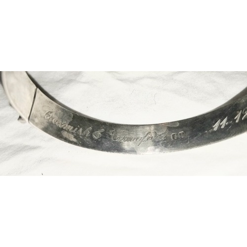 41 - AN IRISH SILVER BANGLE, of Cork interest: hallmarked for Dublin with date letter for 1977, vacant ca... 