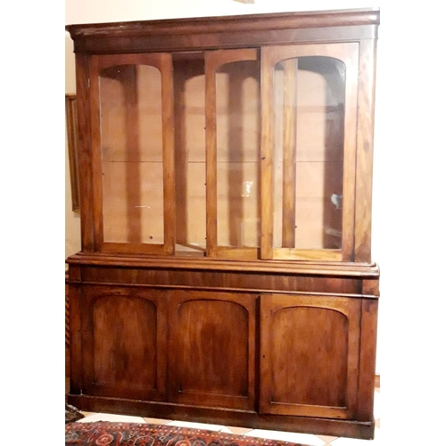 48 - A LARGE THREE BAY VICTORIAN GLAZED BOOKCASE CABINET, superb colour and condition to the wood. The to... 