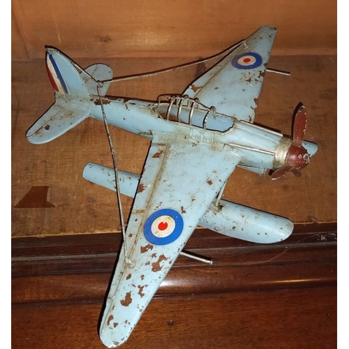 51 - A LARGE VINTAGE WORLD WAR II TIN PLATR SEA PLANE MODEL, 41cm wingspan, 28cm long.