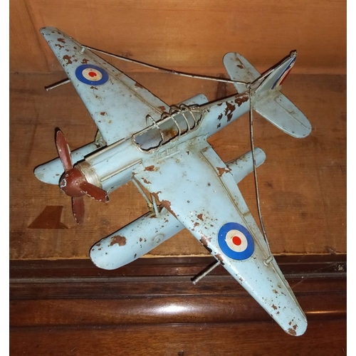 51 - A LARGE VINTAGE WORLD WAR II TIN PLATR SEA PLANE MODEL, 41cm wingspan, 28cm long.