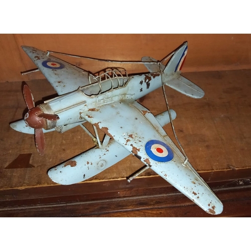 51 - A LARGE VINTAGE WORLD WAR II TIN PLATR SEA PLANE MODEL, 41cm wingspan, 28cm long.