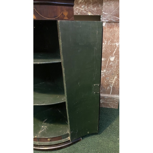 52 - A GEORGIAN BOW FRONTED HANGING CORNER CABINET, with a graduated pediment top, over a row of inlaid u... 