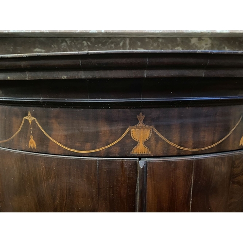 52 - A GEORGIAN BOW FRONTED HANGING CORNER CABINET, with a graduated pediment top, over a row of inlaid u... 