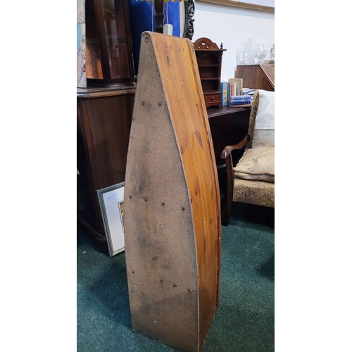 57 - A LOVELY PINE BOAT-SHAPED OPEN FLOOR BOOKCASE OR DISPLAY CABINET, of graduated form; having three op... 