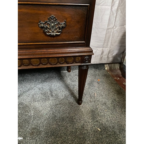 64 - A FINE MAHOGANY TWO DRAWER CHEST, the crossbanded top with molded edge, above two panelled drawers w... 