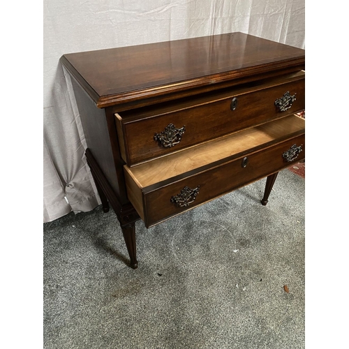 64 - A FINE MAHOGANY TWO DRAWER CHEST, the crossbanded top with molded edge, above two panelled drawers w... 