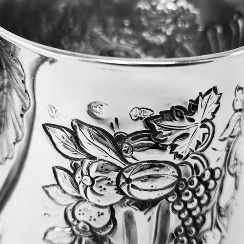 68 - A VERY DECORATIVE IRISH GEORGE II SILVER CHASED MUG, Hallmarked maker William Townsend, Dublin, c.17... 