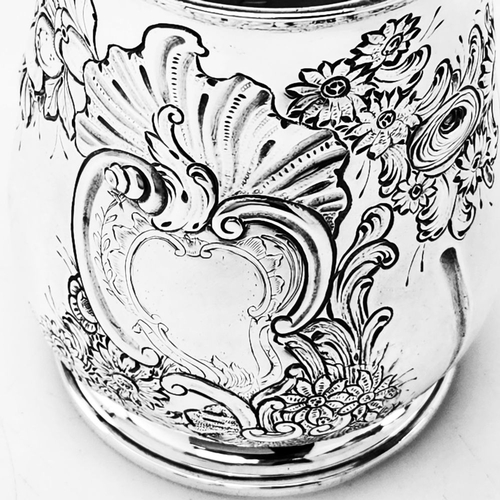 68 - A VERY DECORATIVE IRISH GEORGE II SILVER CHASED MUG, Hallmarked maker William Townsend, Dublin, c.17... 