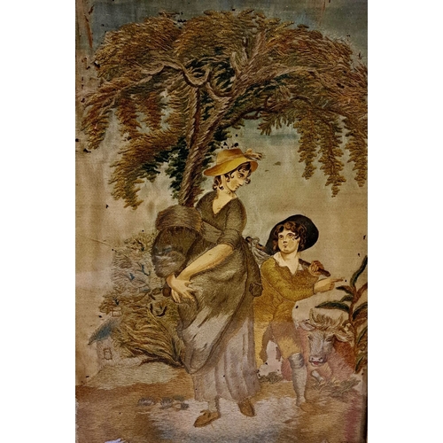 69 - A 19TH CENTURY GILT-FRAMED BUCOLIC EMBROIDERED WATERCOLOUR depicting pastoral scene of a woman and y... 