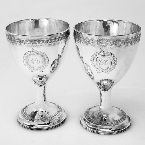 79 - A RARE PAIR OF IRISH GEORGE III SILVER GOBLETS, Hallmarked Maker Gustavas Byrne, Dublin 1802 & 1808.... 