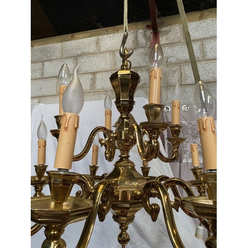 91 - AN EXCELLENT HEAVY BRASS TWO TIER CHANDELIER, the top tier having four arms, with scroll armrests an... 