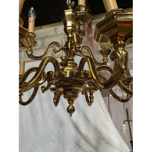 91 - AN EXCELLENT HEAVY BRASS TWO TIER CHANDELIER, the top tier having four arms, with scroll armrests an... 