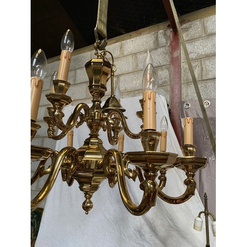 91 - AN EXCELLENT HEAVY BRASS TWO TIER CHANDELIER, the top tier having four arms, with scroll armrests an... 