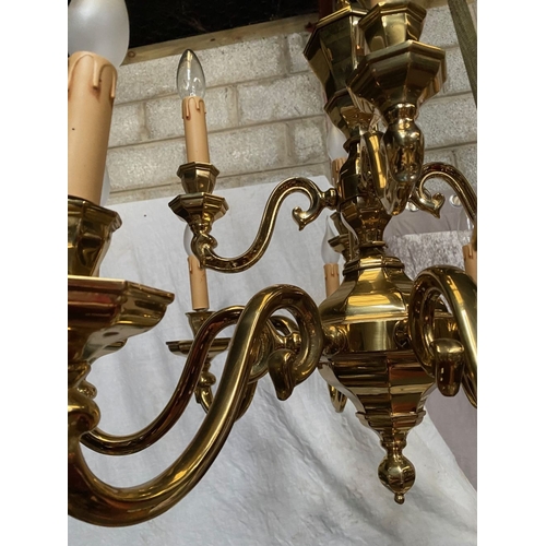 91 - AN EXCELLENT HEAVY BRASS TWO TIER CHANDELIER, the top tier having four arms, with scroll armrests an... 