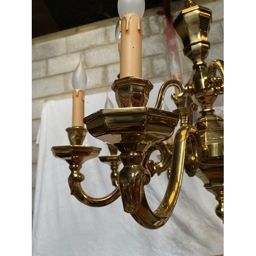 91 - AN EXCELLENT HEAVY BRASS TWO TIER CHANDELIER, the top tier having four arms, with scroll armrests an... 