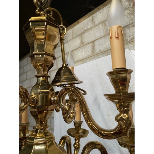 91 - AN EXCELLENT HEAVY BRASS TWO TIER CHANDELIER, the top tier having four arms, with scroll armrests an... 