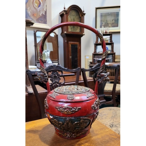 93 - A VERY GOOD VINTAGE RED-LAQUERED CHINESE WEDDING GIFT BASKET, the upright curved handle decorated wi... 