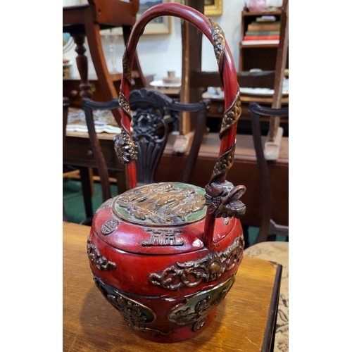 93 - A VERY GOOD VINTAGE RED-LAQUERED CHINESE WEDDING GIFT BASKET, the upright curved handle decorated wi... 