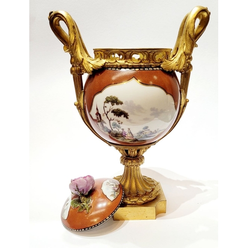 96 - AN ORMOLU MOUNTED MEISSEN PORCELAIN LIDDED VESSEL, the lid mounted with a rose blossom finial, the b... 