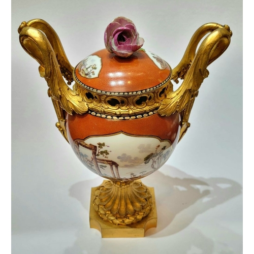 96 - AN ORMOLU MOUNTED MEISSEN PORCELAIN LIDDED VESSEL, the lid mounted with a rose blossom finial, the b... 