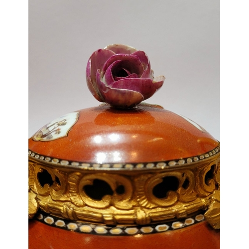 96 - AN ORMOLU MOUNTED MEISSEN PORCELAIN LIDDED VESSEL, the lid mounted with a rose blossom finial, the b... 