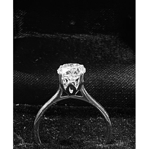 108 - A BEAUTIFUL 18CT WHITE GOLD DIAMOND SOLITAIRE RING, 1.57ct diamond, colour G, clarity VS2, in four c... 