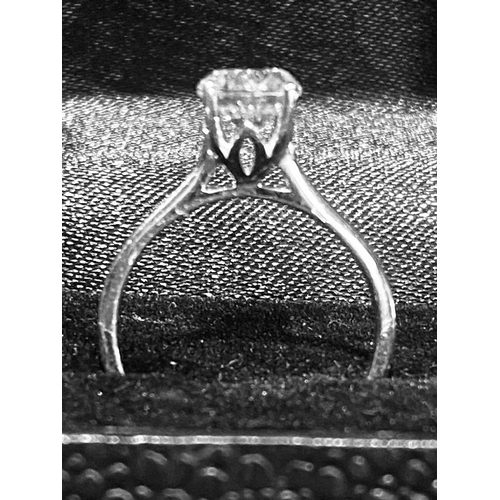 108 - A BEAUTIFUL 18CT WHITE GOLD DIAMOND SOLITAIRE RING, 1.57ct diamond, colour G, clarity VS2, in four c... 