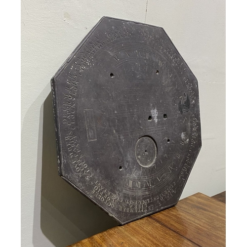 105 - A RARE 19TH CENTURY SUNDIAL PLATE, the octagonal slate engraved with sunburst design to centre, with... 