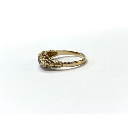 107 - A 9CT YELLOW GOLD GRADUATED FIVE STONE DIAMOND RING, with five round cut diamonds graduated from cen... 