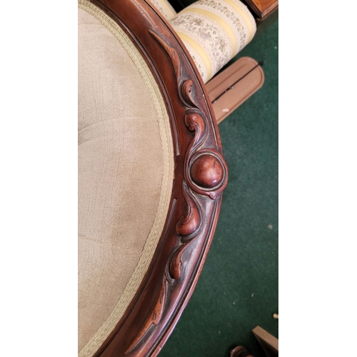 110 - A VICTORIAN MAHOGANY FRAMED LOUNGE CHAIR, with curved back & arm rests, the frame decorated with bea... 