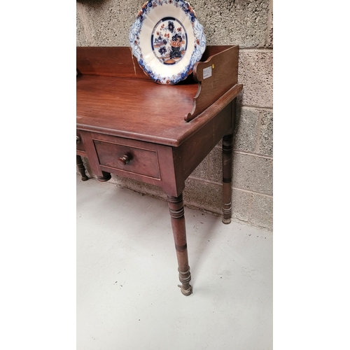 111 - AN IRISH - CORK - EARLY 19TH CENTURY BREAKFRONT THREE DRAWER HALL TABLE / SERVING TABLE, with raised... 