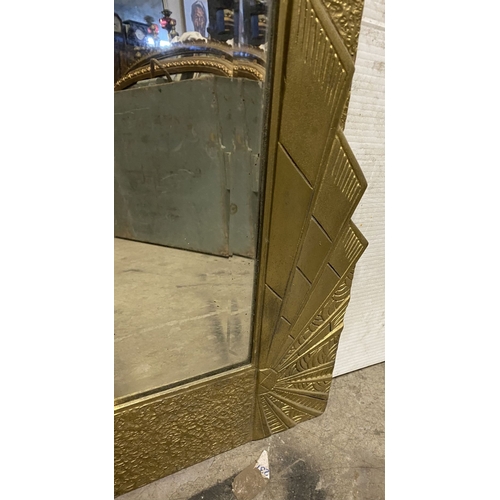 178 - A GOOD ART DECO STYLE GILT OVERMANTLE/HALL MIRROR, the rectangular bevelled glass in heavy gilt hard... 