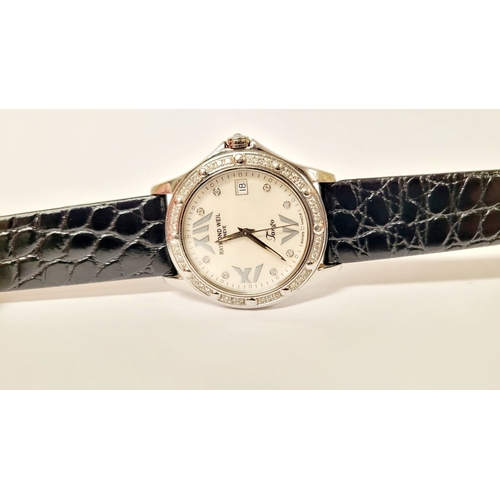 19 - A VERY FINE RAYMOND WEIL DIAMOND ENCRUSTED LADIES WATCH, with leather strap. From the Tango Collecti... 