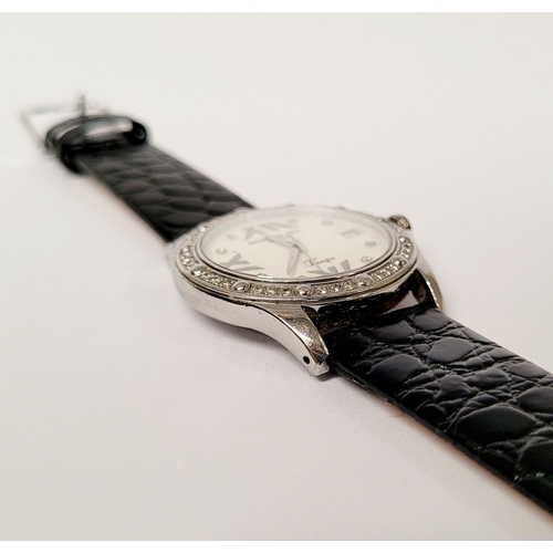 19 - A VERY FINE RAYMOND WEIL DIAMOND ENCRUSTED LADIES WATCH, with leather strap. From the Tango Collecti... 