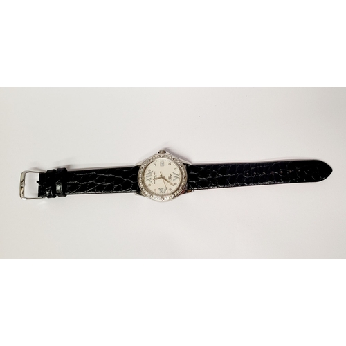 19 - A VERY FINE RAYMOND WEIL DIAMOND ENCRUSTED LADIES WATCH, with leather strap. From the Tango Collecti... 