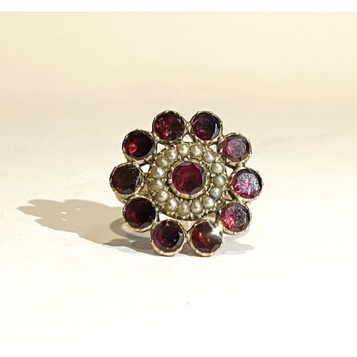 3 - A BEAUTIFUL GARNET SEEDED PEARL 9CT GOLD CLUSTER RING, with central garnet surrounded by row of seed... 