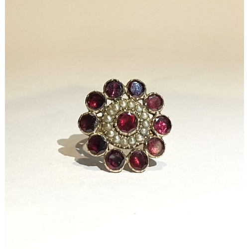 3 - A BEAUTIFUL GARNET SEEDED PEARL 9CT GOLD CLUSTER RING, with central garnet surrounded by row of seed... 