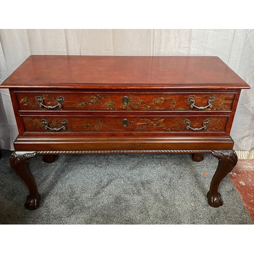 32 - A CHIPPENDALE STYLE CHINOISERIE DECORATED LOW RISE TWO DRAWER CHEST, decorated with a mottled gilt a... 