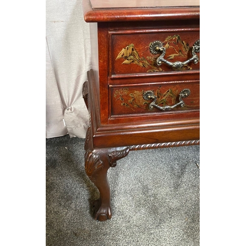 32 - A CHIPPENDALE STYLE CHINOISERIE DECORATED LOW RISE TWO DRAWER CHEST, decorated with a mottled gilt a... 