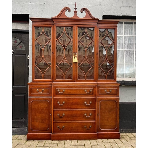 4 - A VERY FINE MAHOGANY BREAKFRONT LIBRARY SECRETAIRE BOOKCASE, to the top a swan neck pediment with fi... 