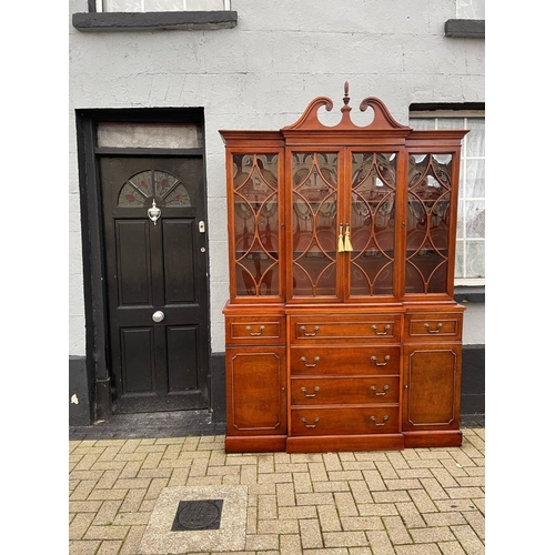 4 - A VERY FINE MAHOGANY BREAKFRONT LIBRARY SECRETAIRE BOOKCASE, to the top a swan neck pediment with fi... 