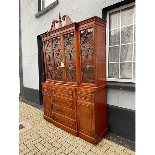 4 - A VERY FINE MAHOGANY BREAKFRONT LIBRARY SECRETAIRE BOOKCASE, to the top a swan neck pediment with fi... 